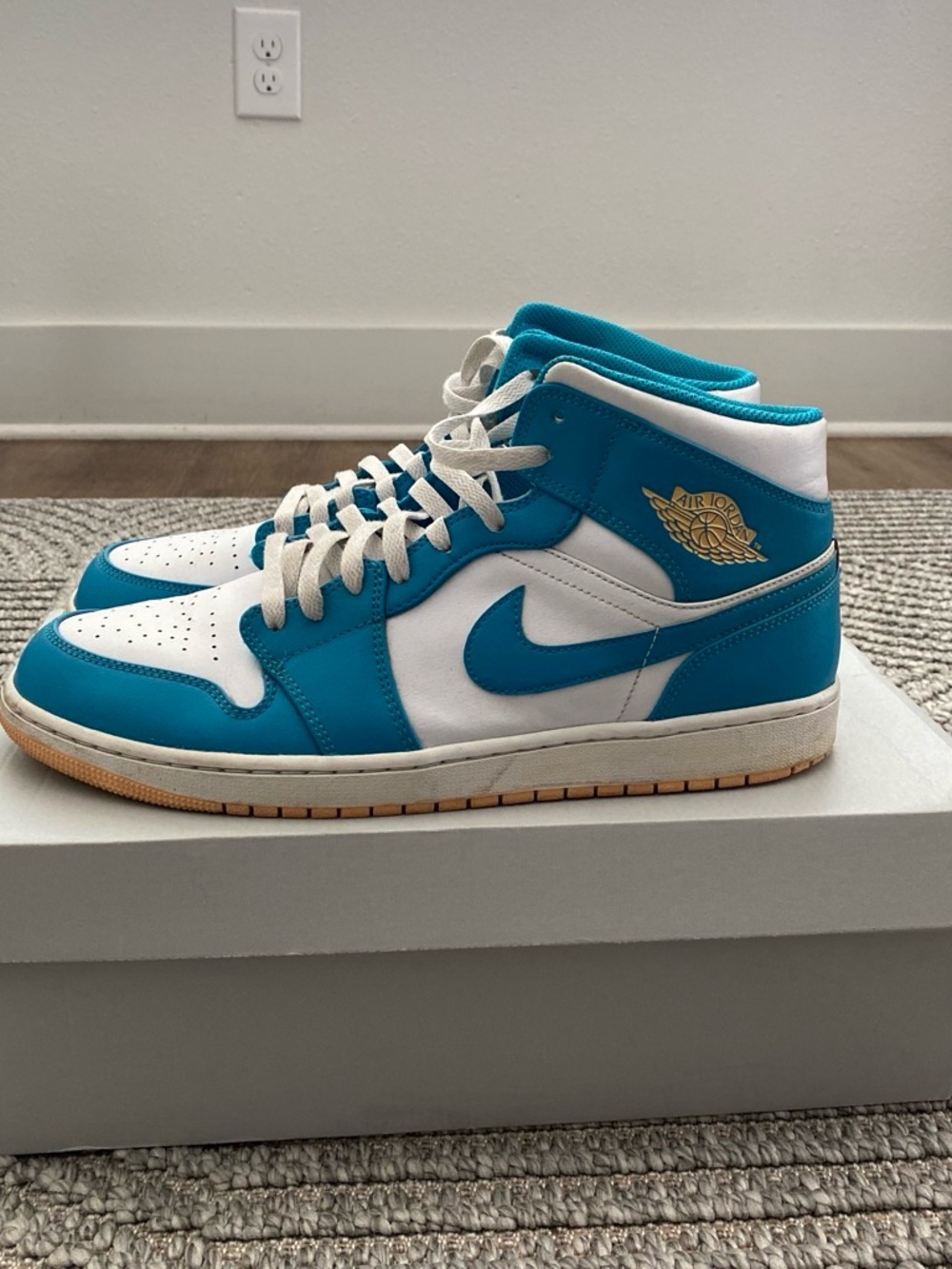 Jordan Air Jordan 1 Mid White and Teal Basketball Sneakers